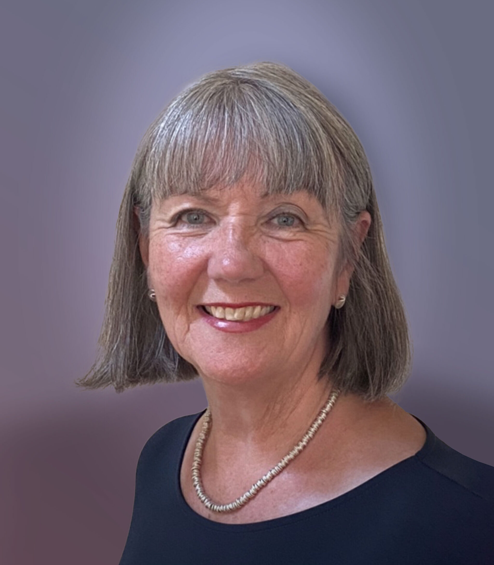 A headshot of Heather Bowman against a purple background.